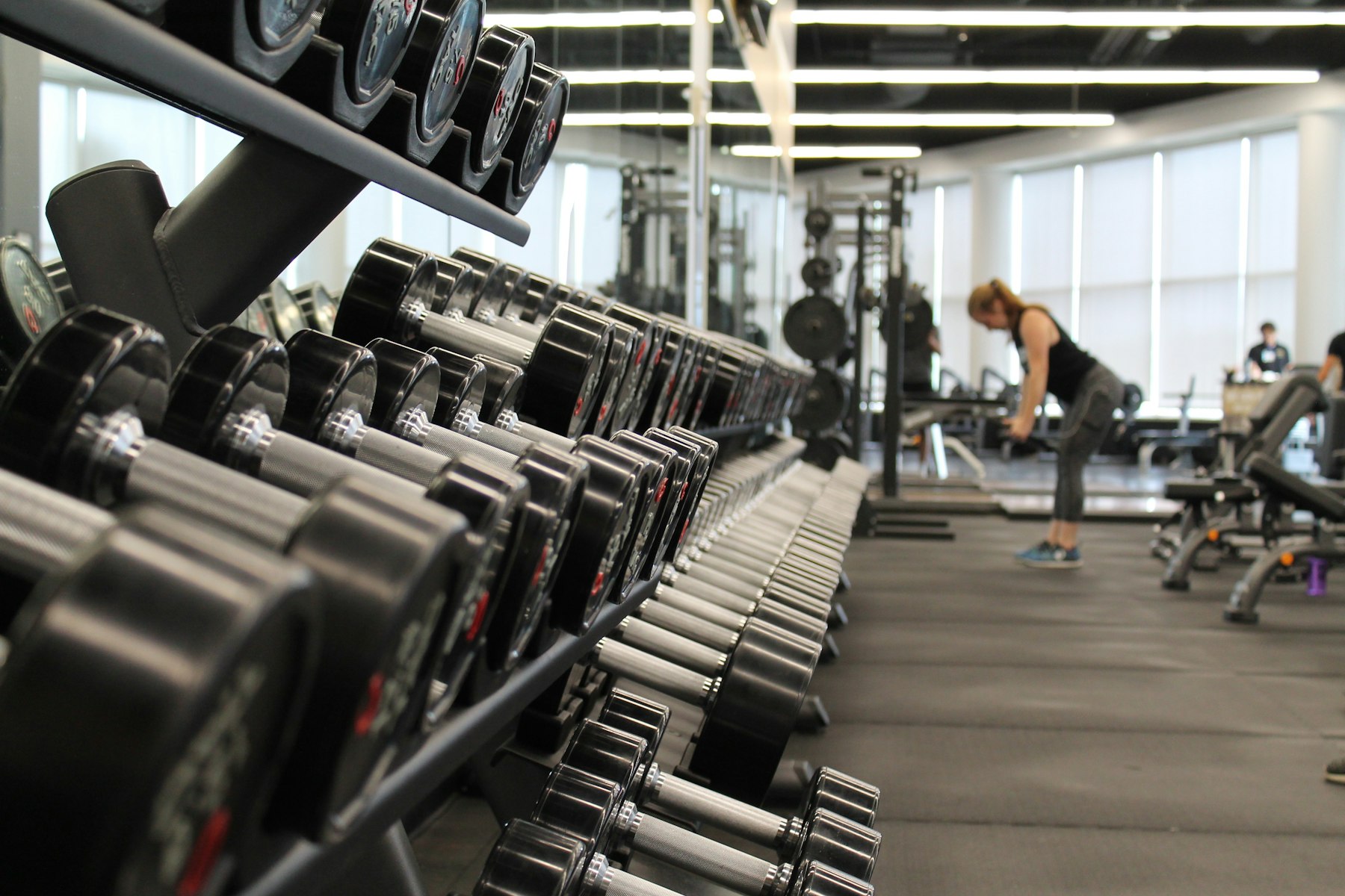 Athlete training with dumbbells at Kaizen The Gym